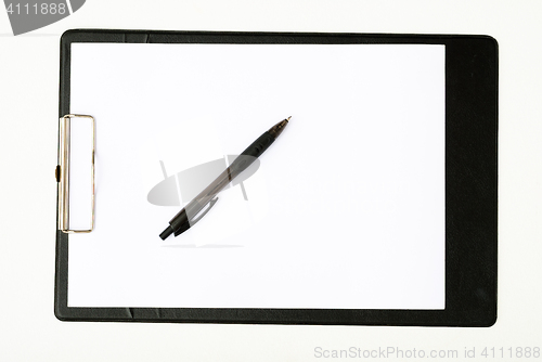 Image of Black clipboard with a pen isolated