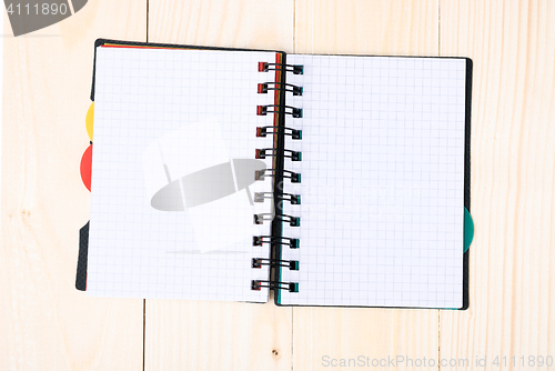 Image of notepad with pen isolated