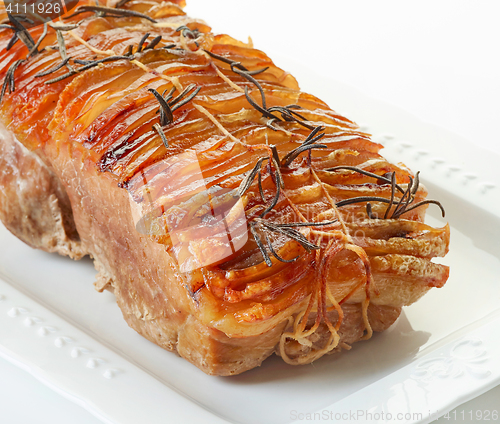 Image of roasted pork on white plate