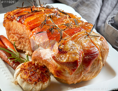 Image of roasted pork on white plate