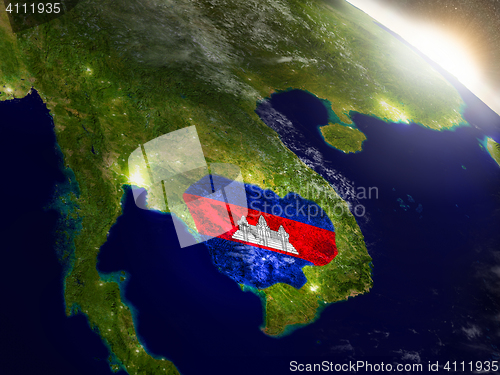 Image of Cambodia with flag in rising sun