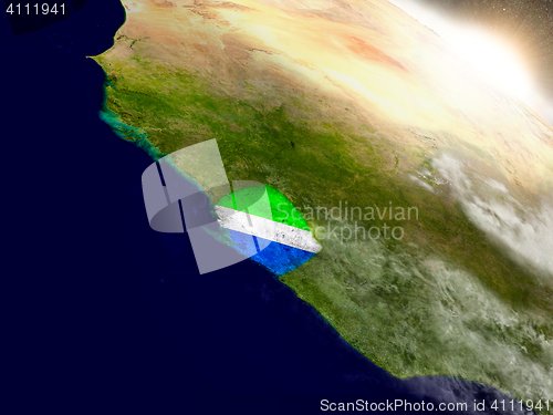 Image of Sierra Leone with flag in rising sun