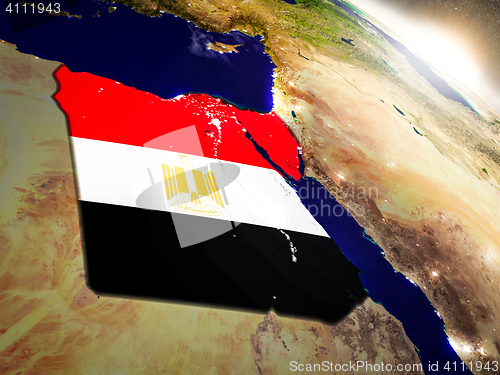 Image of Egypt with flag in rising sun