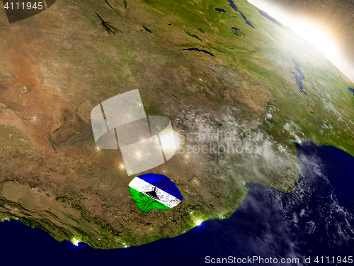 Image of Lesotho with flag in rising sun