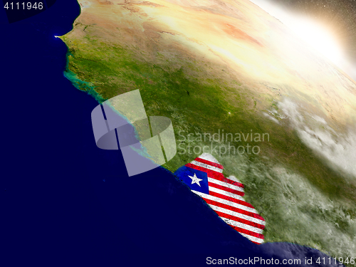 Image of Liberia with flag in rising sun