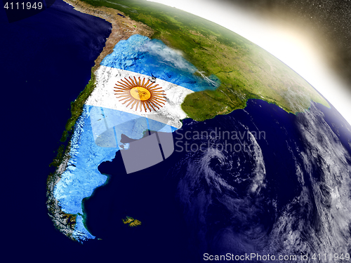 Image of Argentina with flag in rising sun