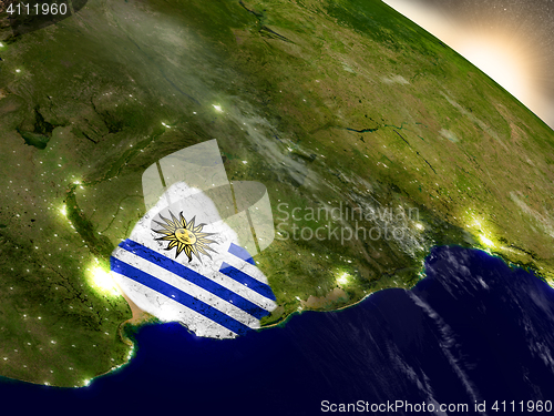 Image of Uruguay with flag in rising sun