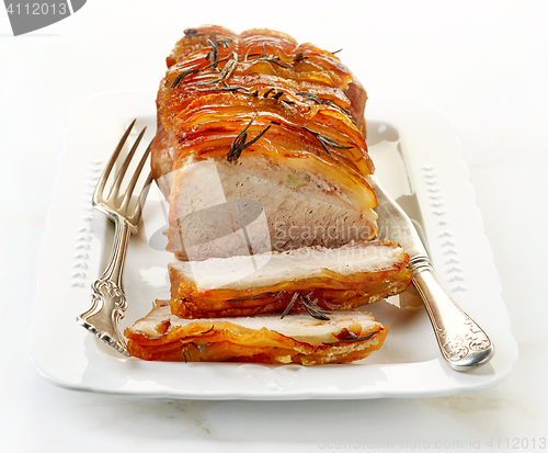 Image of roasted pork on white plate