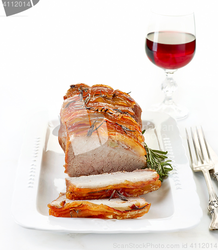 Image of roasted pork and red wine