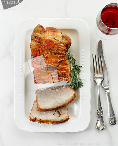 Image of roasted pork on white plate