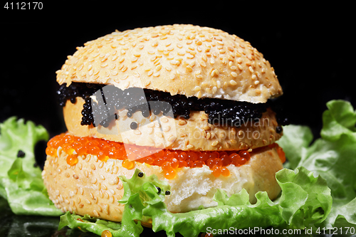 Image of Caviar sandwich on lettuce