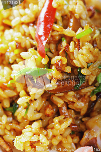 Image of Vietnamese pilaf served with vegetables closeup