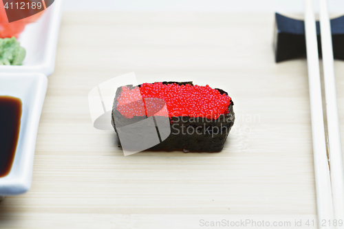 Image of Tobiko sushi on served table