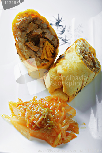 Image of Rolled beef sandwich above view