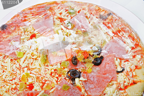 Image of Half-opened frozen pizza