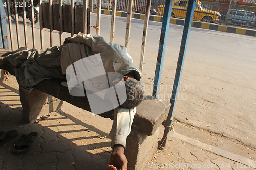 Image of Homeless people sleeping on the footpath of Kolkata