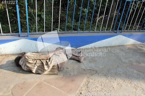 Image of Homeless people sleeping on the footpath of Kolkata