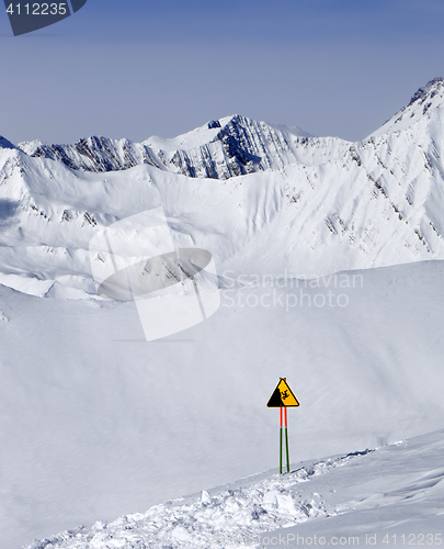 Image of Warning sing on ski slope