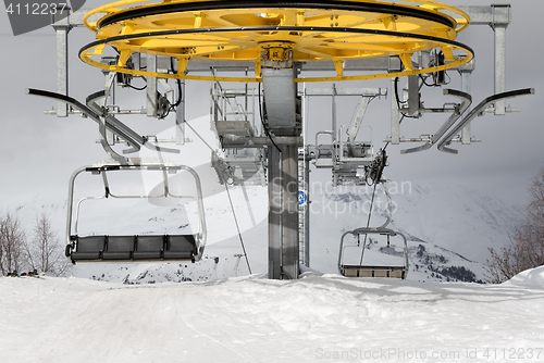 Image of Top station of ropeway and gray sky in winter day