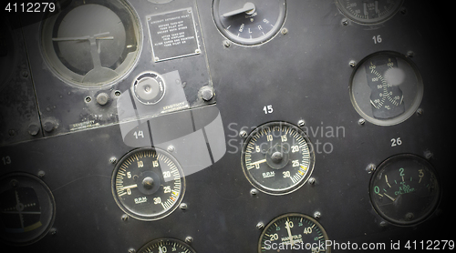 Image of Different meters and displays in an old plane