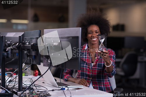 Image of portrait of a young successful African-American woman in modern 