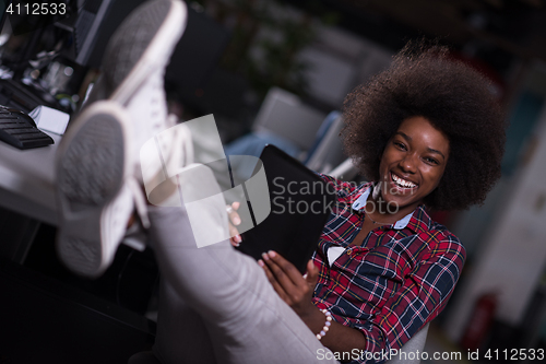 Image of portrait of a young successful African-American woman in modern 