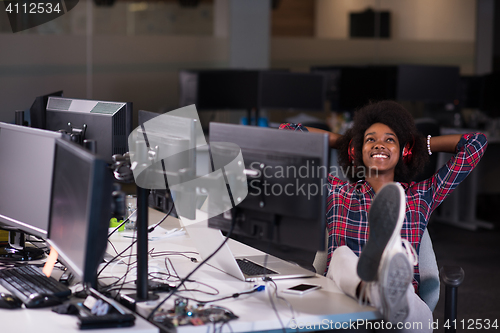 Image of portrait of a young successful African-American woman in modern 