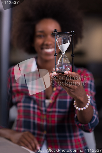 Image of portrait of a young successful African-American woman in modern 