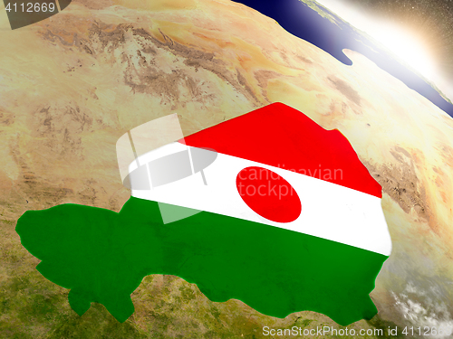 Image of Niger with flag in rising sun