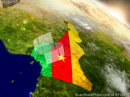 Image of Cameroon with flag in rising sun