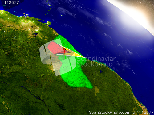 Image of Guyana with flag in rising sun