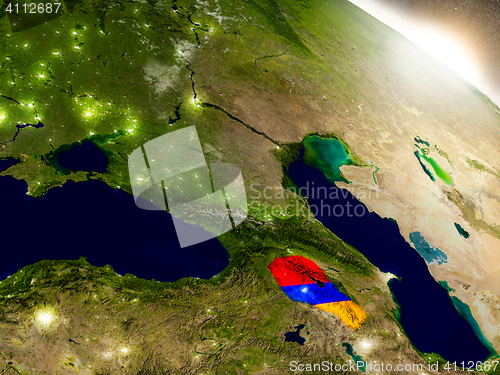 Image of Armenia with flag in rising sun