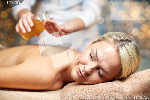 Image of close up of woman lying on massage table in spa