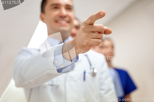 Image of close up of doctor pointing finger at hospital