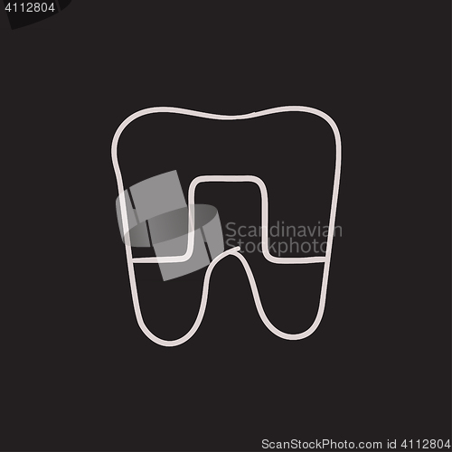 Image of Crowned tooth sketch icon.