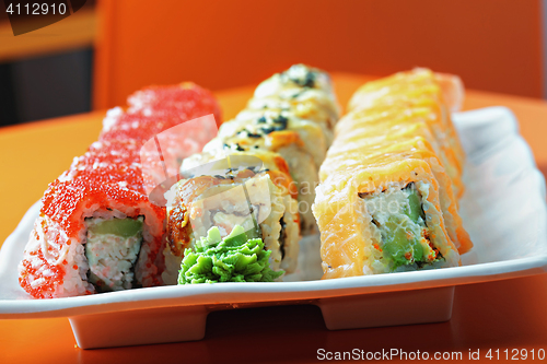 Image of Set of sushi rolls on the cafe table