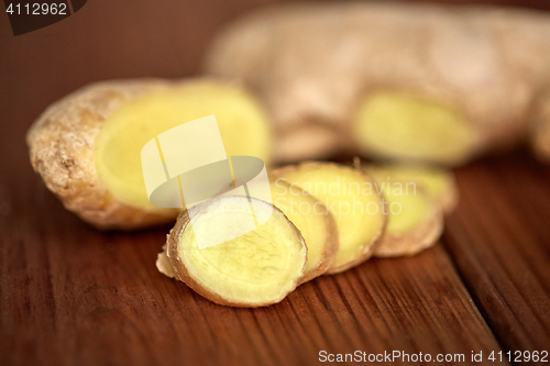 Image of close up of ginger root on wooden table