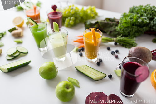 Image of glasses with different fruit or vegetable juices