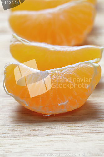 Image of Tangerine slices in a row