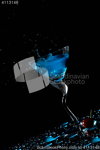 Image of Blue cocktail splash and cherry