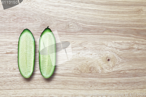 Image of Two halves of cucumber