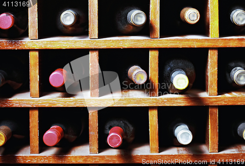 Image of Wine bottles in cells