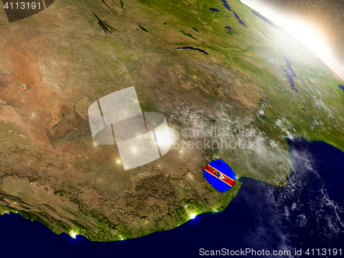 Image of Swaziland with flag in rising sun