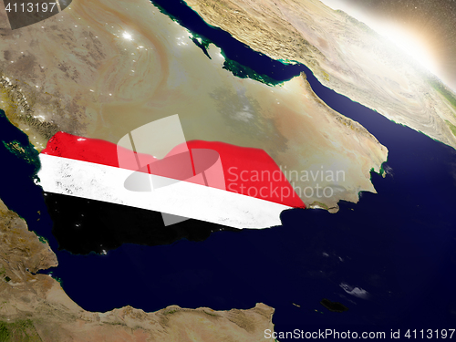 Image of Yemen with flag in rising sun