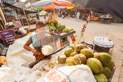 Image of Coconut milk seller