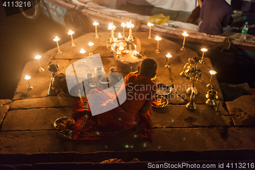 Image of Boy with offerings to the Ganges