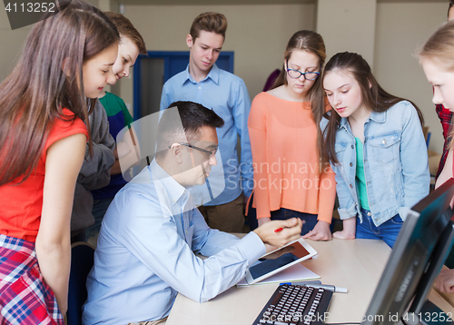 Image of group of students and teacher at school classroom