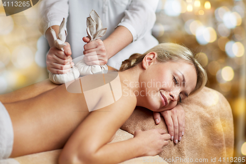 Image of close up of woman lying on massage table in spa