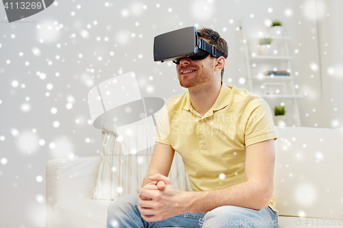 Image of young man in virtual reality headset or 3d glasses