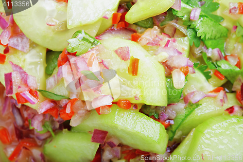 Image of Cucumber and onions salad closeup